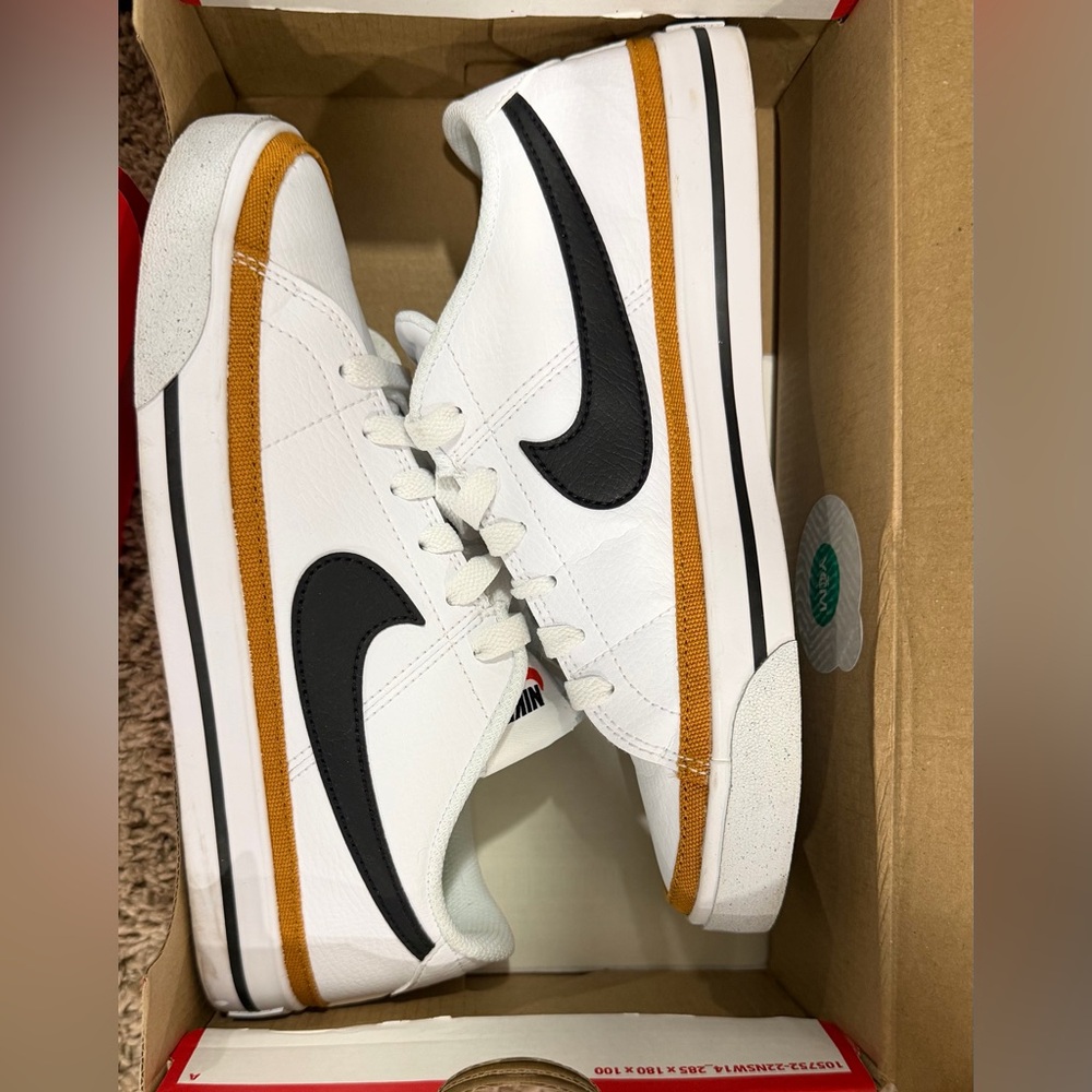 Nike Women’s White and Black Sneakers